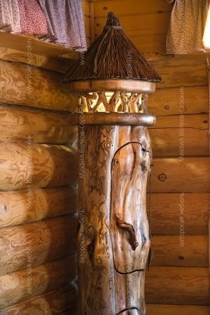 Bar from a log with a lamp